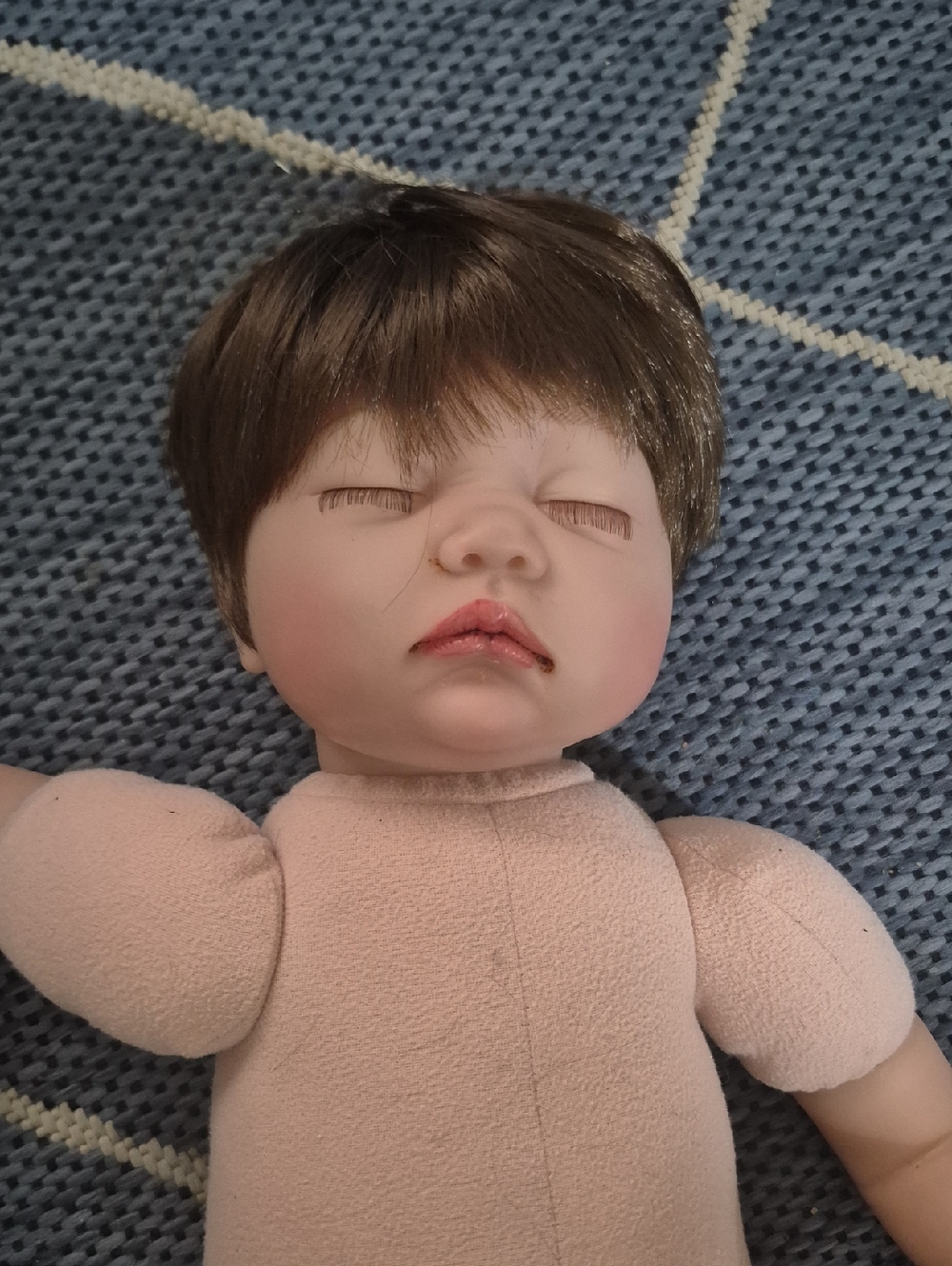 Realistic reborn sleeping doll Posable
